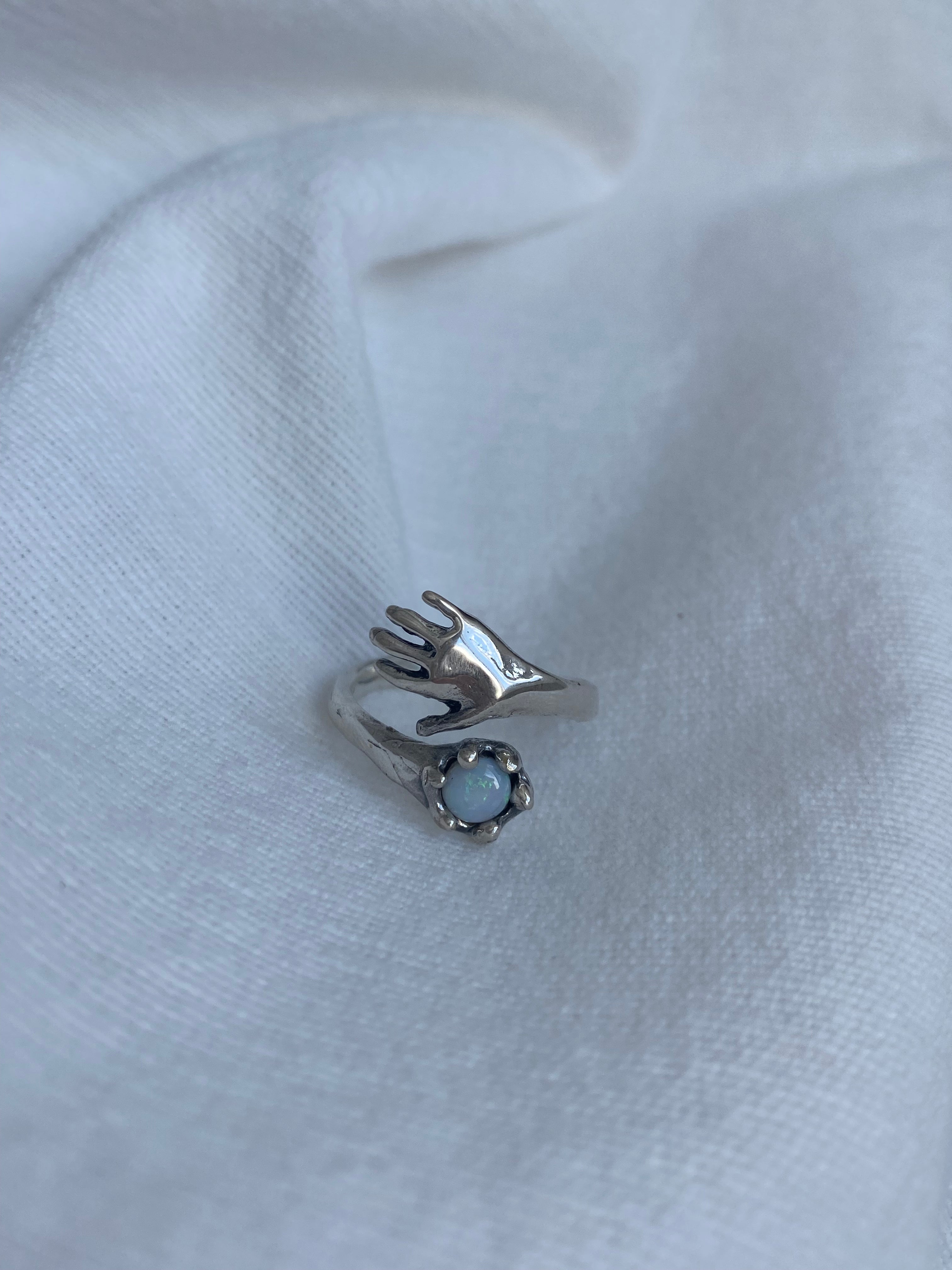 Hold tight gemstone ring