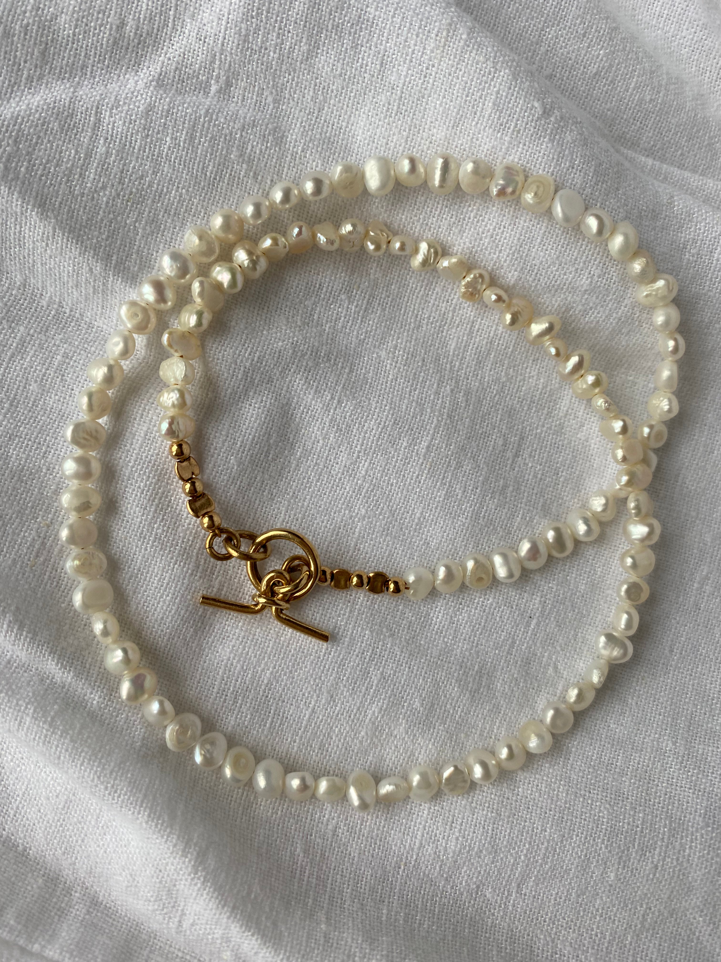 Pearl strand with toggle clasp